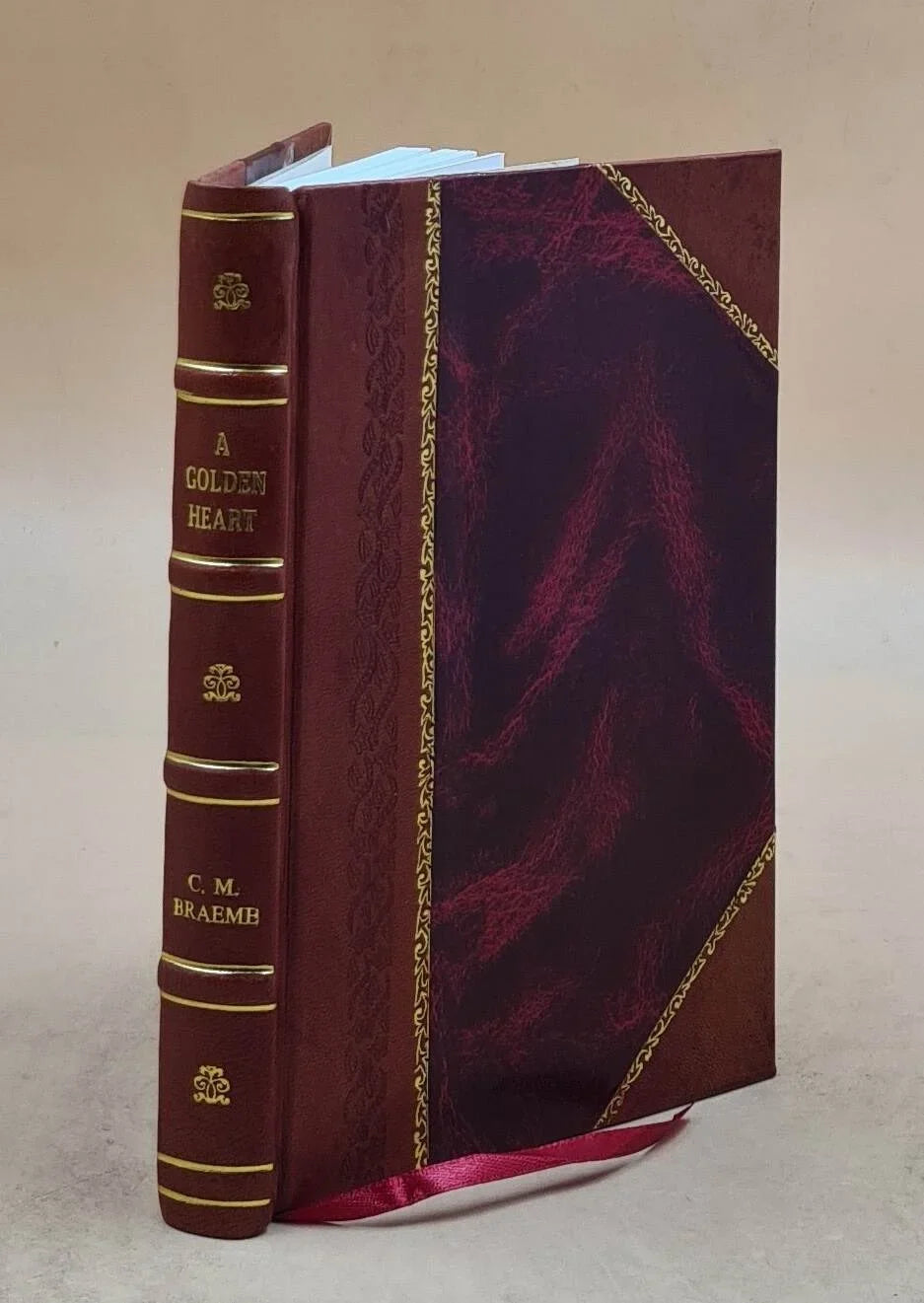 1889 [Leather Bound]. Braeme. A golden heart, by Charlotte M